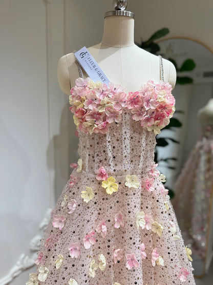 Alice Gown with pink and yellow 3D floral appliqués, beaded lace, sweetheart neckline, and stone-accented straps.