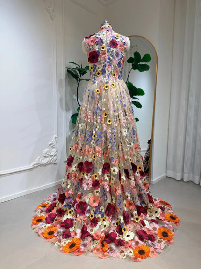 High-neck A-line wedding dress featuring colorful 3D floral embroidery on a sheer tulle skirt with a sweeping train.