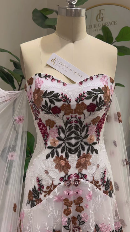 Kora – Boho Wedding Dress with Colorful Flowers, Removable Cape Sleeves & Corset Back